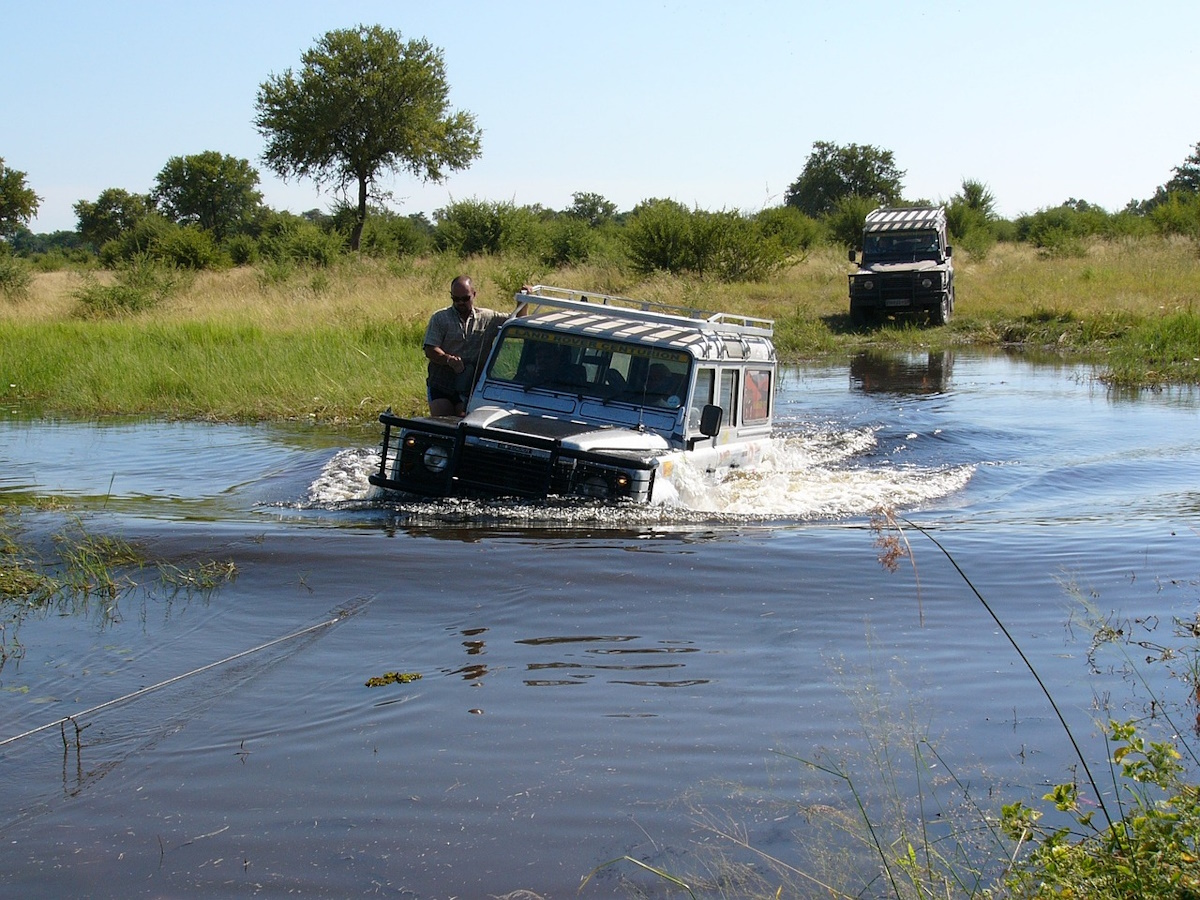 Aerial view of the Okavango Delta with winding waterways and lush vegetation